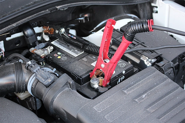 Battery with jumper cables attached